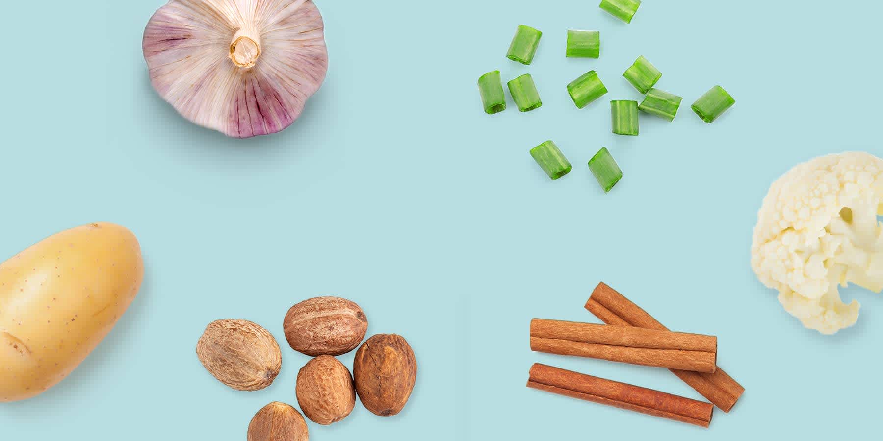 Assortment of holiday foods against a blue background