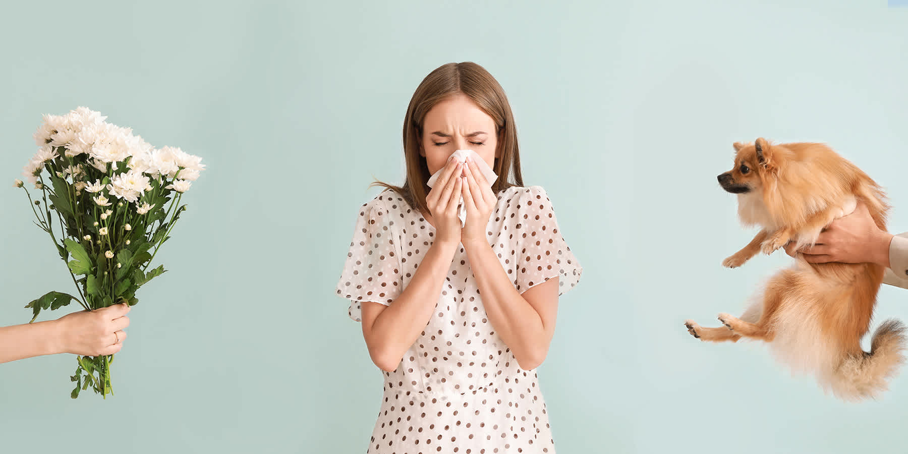 Woman next to dog sneezing and experiencing allergic reaction