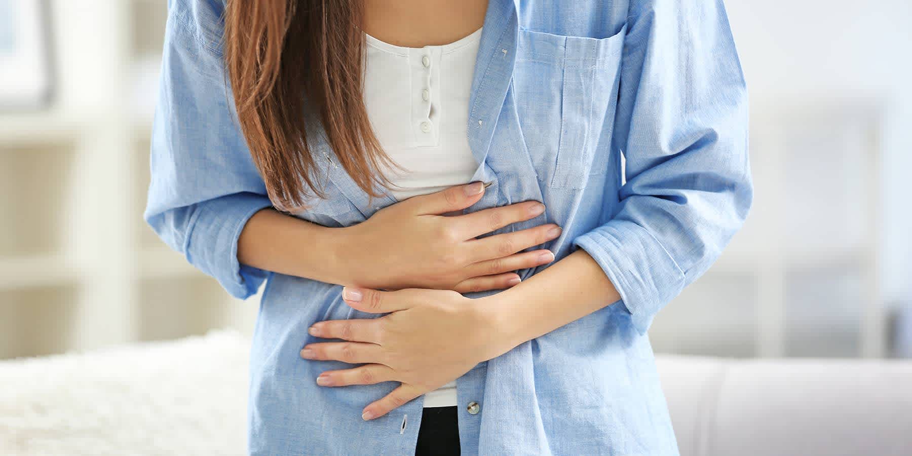 Woman experiencing UTI symptoms and wondering what things to avoid